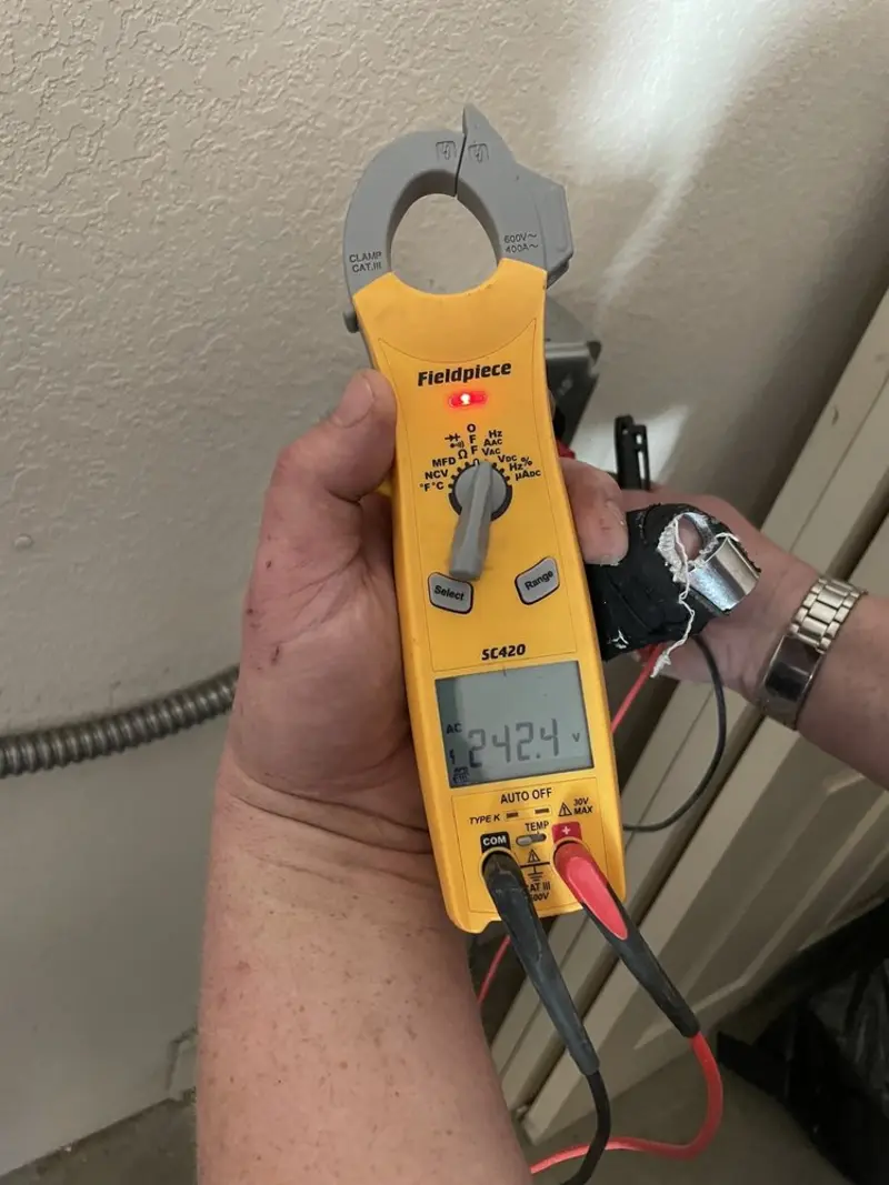 Voltage testing with clamp meter during Aluminum Wiring Replacement in Avon